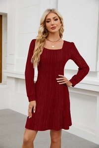 Detail of dark red square neck dress showing vertical textured fabric and slim waist fit