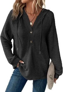 Close-up of charcoal waffle knit hoodie featuring a V-neckline with decorative buttons