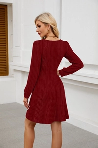 Detail showing dark red long sleeve dress with square neck and ribbed texture