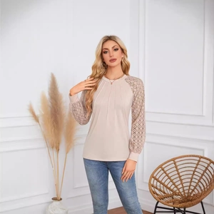 Champagne long sleeve top with lace patchwork sleeves and pleated crewneck design