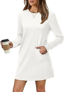Detail showing side pockets and soft cotton fabric of the white long sleeve dress