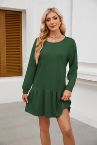 Detail of deep green casual dress featuring long sleeves and ruffled hem stitching