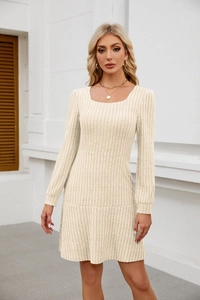 Close-up of ribbed knit texture on a beige square neck long sleeve mini dress