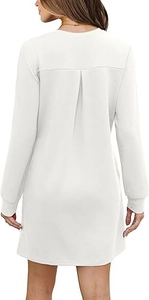 Detailed back view of white crewneck dress featuring a stylish inverted pleat design