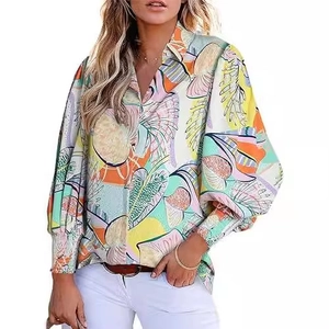 Women's abstract print long sleeve shirt with V-neck and puff sleeves on white background