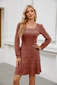 Detail view of the rust red square neck dress featuring vertical rib-knit texture