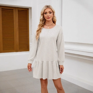 Long sleeve crew neck casual dress in light grey with ruffled hem and crisscross neckline