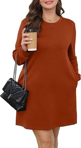 Detail of caramel long sleeve crew neck dress with functional side pockets and loose fit