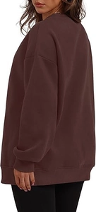 Detail view of oversized chocolate brown fleece sweatshirt with ribbed cuffs and hem