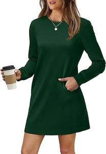 Detail view of deep green long-sleeve dress featuring practical side pockets and crew neck