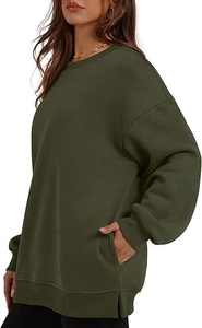 Detail view of olive green oversized sweatshirt with side pocket and slit hem