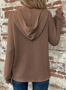 Detail view of coffee brown waffle knit texture on a long sleeve hoodie for women