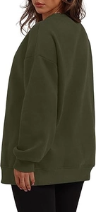 Detailed side view showing oversized fit and quality stitching of dark green sweatshirt