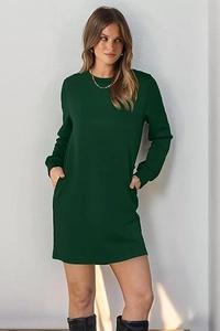 Detail of a dark green long sleeve crewneck dress with side pockets and ribbed cuffs