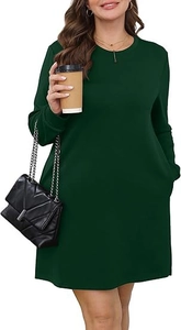 Detail of dark green crewneck dress with long sleeves and functional side pockets