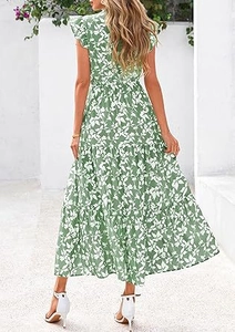 Back view of tiered floral maxi dress with ruffle sleeves and green printed pattern
