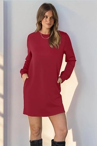 Detail view of deep red crew neck sweatshirt dress with side pockets and long sleeves