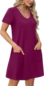 Detail of short sleeve V-neck A-line dress in plum purple with functional front pockets