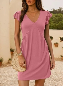 Detail of V-neckline and ruffled cap sleeves on a pink mini dress for casual wear