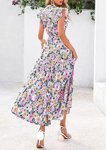 Detail of floral chiffon maxi dress featuring flutter sleeves and layered ruffled hemline