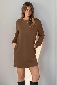 Detail view of the brown long sleeve dress featuring practical side pockets and crew neck