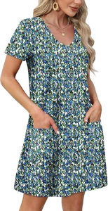 Detailed close-up showing V-neck design and floral print texture with pocket feature