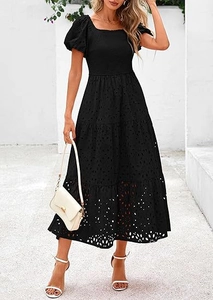Detail of black hollow-out embroidery square neck dress with puff sleeves and ruffled tiers