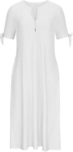 Close-up of white V-neck eyelet dress featuring button details and bow-knot short sleeves