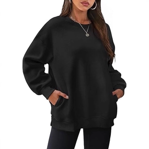 Oversized black crewneck fleece sweatshirt with drop shoulders and side pockets