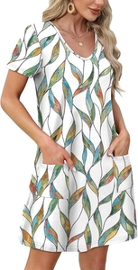 Close-up of V-neck short sleeve dress with colorful leaf print and side patch pockets