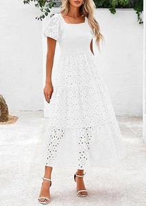 Detail of white square neck mini dress with delicate eyelet embroidery and puffed sleeves