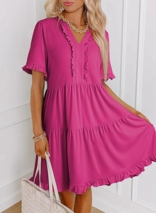 Detail of V-neck tiered mini dress in magenta with ruffle trims and lightweight fabric