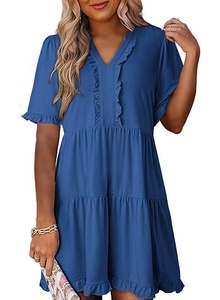 Detail of V-neck and ruffled sleeves on dark blue tiered mini dress for summer