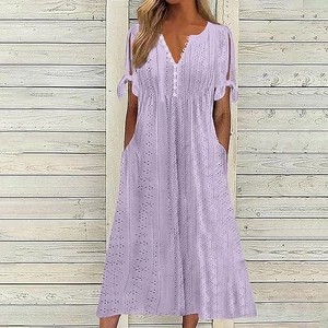 Detail view of the V-neck button-down lavender eyelet dress with knotted sleeve cuffs