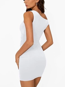 Detail of white off-shoulder bodycon dress showing side ruching and slim fit fabric
