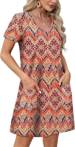 Detail view of V-neck short sleeve dress with geometric ethnic print and two pockets