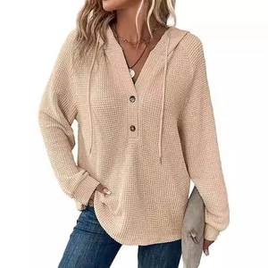 Women's waffle knit hoodie featuring a V-neck with buttons and adjustable drawstrings