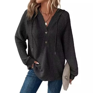 Women's dark grey waffle knit hoodie featuring V-neck buttons and adjustable drawstrings