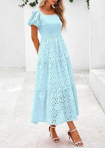 Detail of light blue puff sleeve dress with square neck and eyelet embroidery fabric
