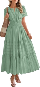 Detail of sage green V-neck dress with textured fabric and elastic pleated waist