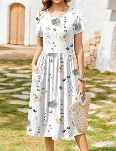 Detail showing high-waisted floral print dress with round neck and practical side pockets
