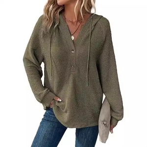 Olive green waffle knit hoodie for women featuring a V-neck with buttons and drawstrings