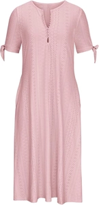 Close-up of pink eyelet dress featuring V-neck, button front and tied sleeve details