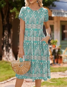 Detailed view of bohemian floral dress with practical side pockets and elastic waist