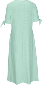 Detail of mint green eyelet dress featuring tie-up sleeve cuffs and geometric embroidery