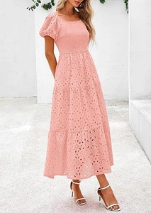 Detail of pink eyelet tiered dress with square neck and smocked bodice for women