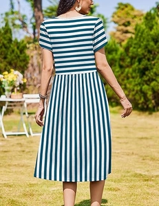 Detail of a women's short-sleeved dress with horizontal and vertical navy striped patterns