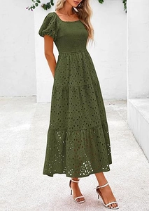 Close-up of olive green square neck dress with eyelet embroidery and puffed sleeves