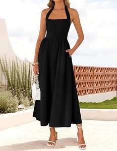 Elegant black halter maxi dress with high waist, side pockets and flowing A-line skirt