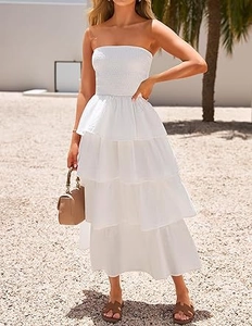 Detail of white strapless smocked tiered maxi dress with layered ruffle skirt